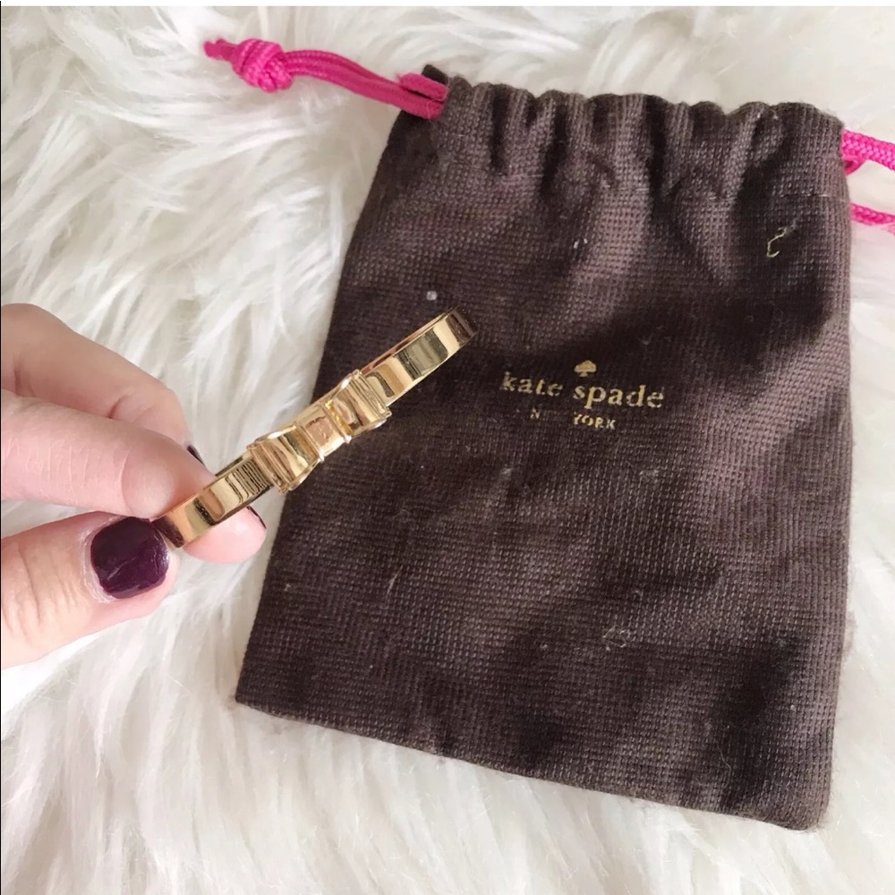 Kate Spade Take a bow gold tone bangle bracelet